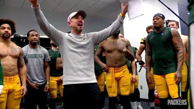 Matt LaFleur celebrating Luke Musgrave for the Green Bay Packers